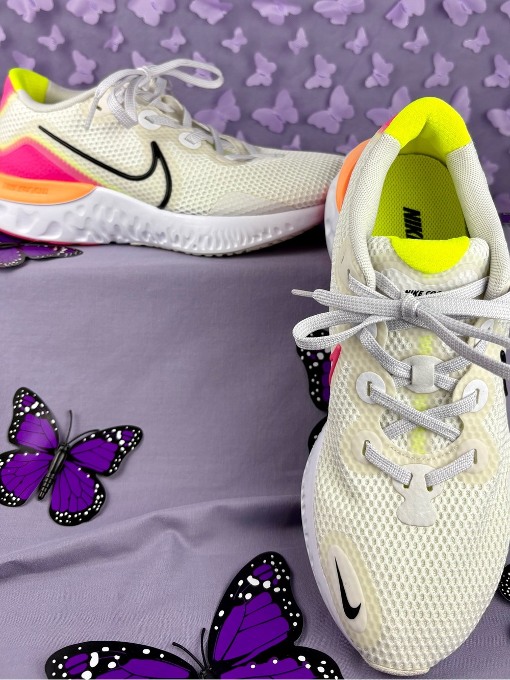 Nike Women's White with neon yellow and pink accents and Blue with pink accents.